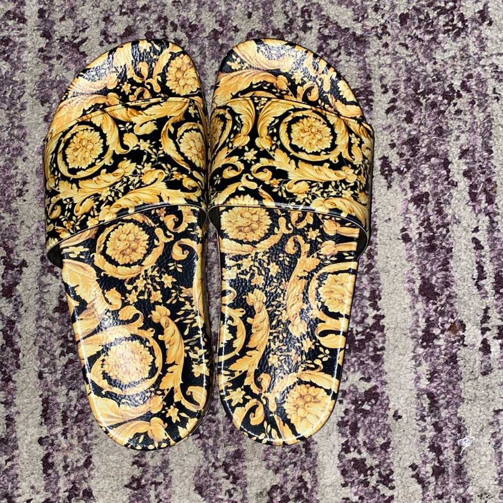 Versace kids slides. Will fit 6 1/2 -7 female adult